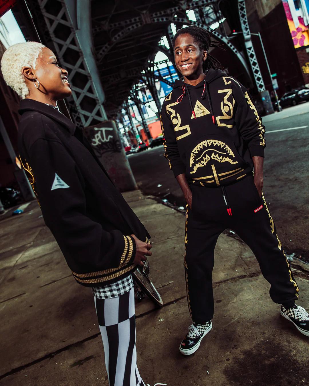A.I.9 AFRICAN INTELLIGENCE GUILDED LEOPARD - SANDFLOWER COLLAB VARSITY | Sprayground Featured