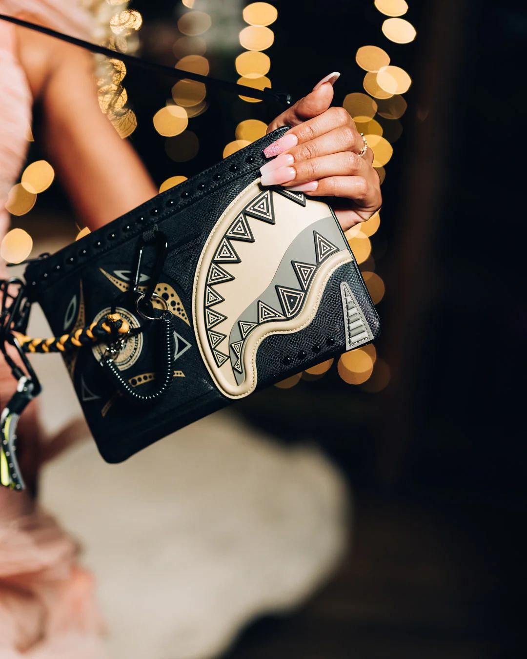 A.I. AFRICAN INTELLIGENCE SHARKS OF THE GOLD OCEAN CROSSOVER CLUTCH - | Sprayground New
