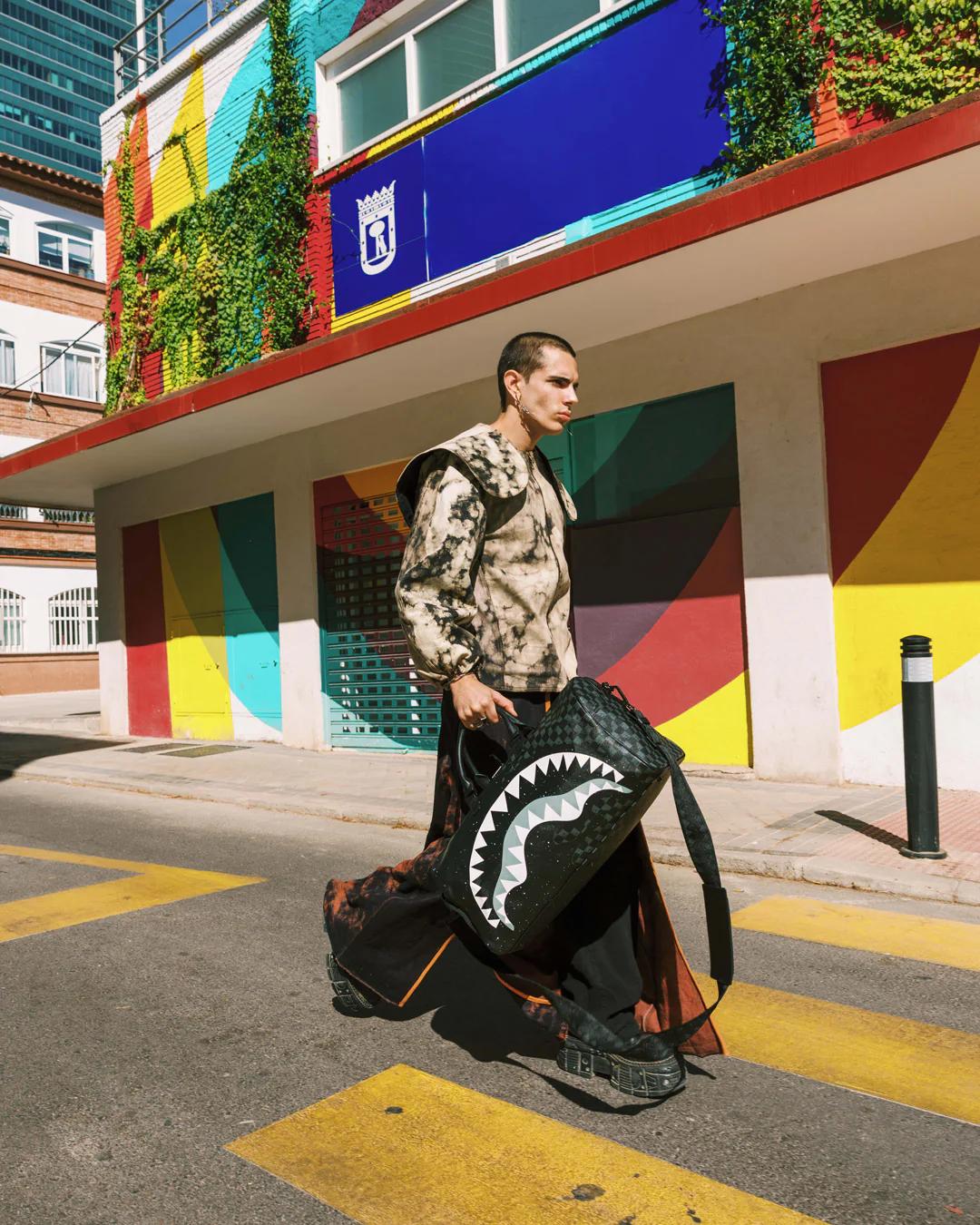 DEEPSPACE SIDE DRIP DUFFLE | Sprayground New