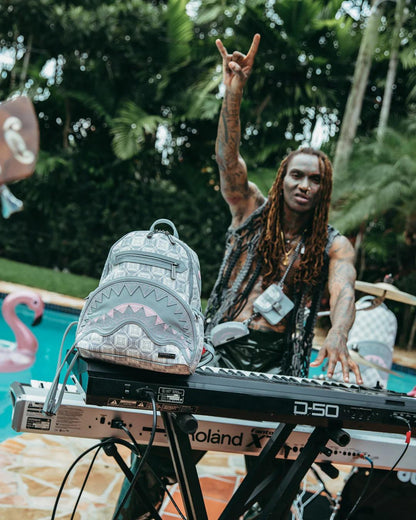 A.I.8 AFRICAN INTELLIGENCE BOOKED & BUSY SAVAGE BACKPACK | Sprayground Exclusive