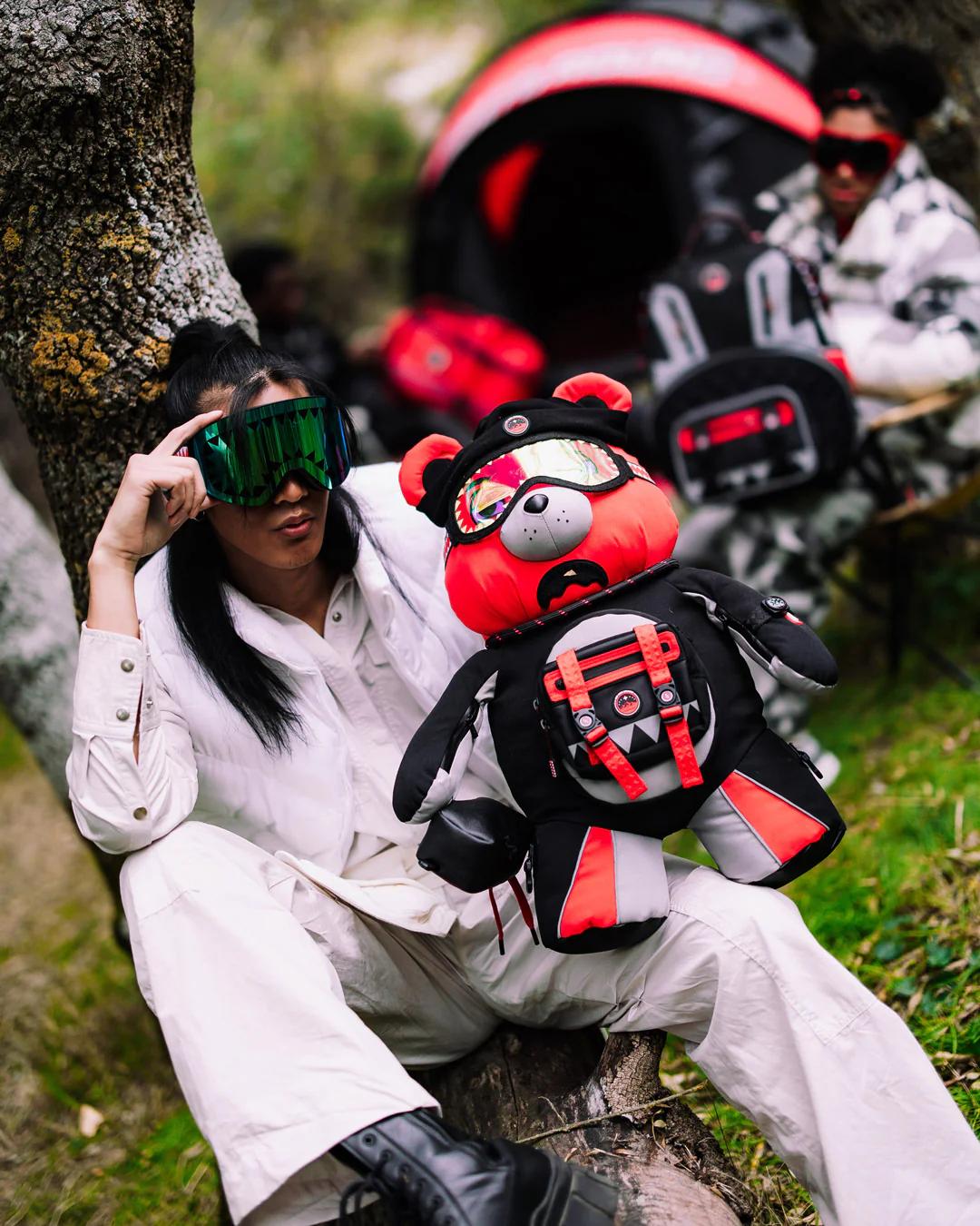 SKY HIGH SEEKERS ARCTIC GPS MONEYBEAR BACKPACK | Sprayground Recommended