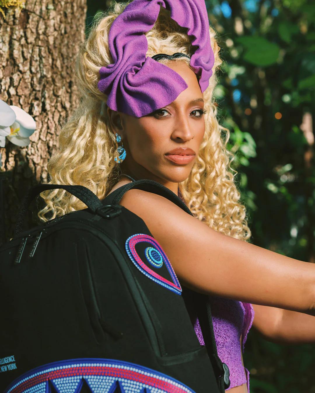 A.I. AFRICAN INTELLIGENCE BORN AND RAISED BACKPACK - SANDFLOWER COLLAB | Sprayground Signature