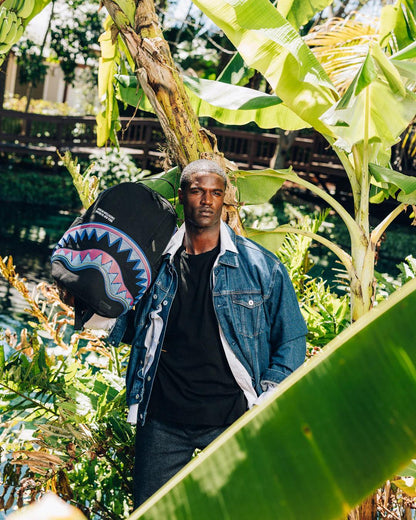 A.I. AFRICAN INTELLIGENCE BORN AND RAISED BACKPACK - SANDFLOWER COLLAB | Sprayground Signature