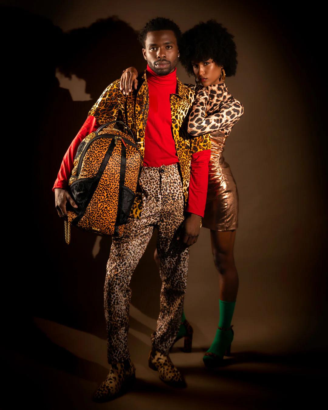 AFRICAN INTELLIGENCE 9 COURAGE LIVES ON BACKPACK - SANDFLOWER COLLAB | Sprayground Quality