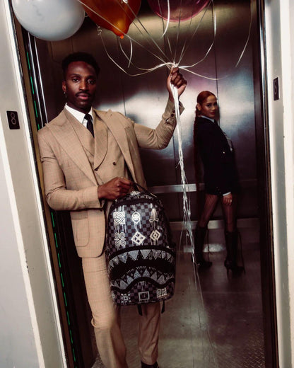 AFRICAN INTELLIGENCE 9 POWER GLYPHICS BACKPACK - SANDFLOWER COLLAB | Sprayground New