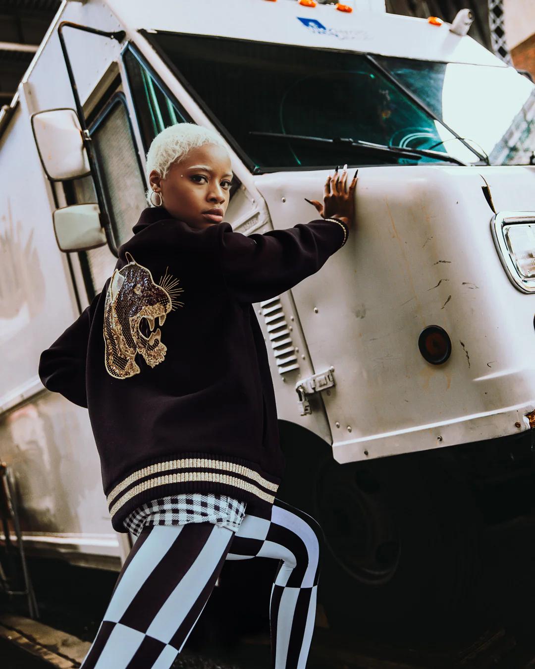 A.I.9 AFRICAN INTELLIGENCE GUILDED LEOPARD - SANDFLOWER COLLAB VARSITY | Sprayground Featured