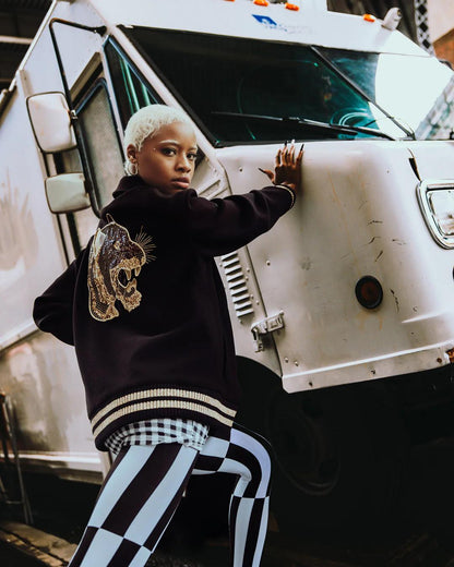 A.I.9 AFRICAN INTELLIGENCE GUILDED LEOPARD - SANDFLOWER COLLAB VARSITY | Sprayground Featured