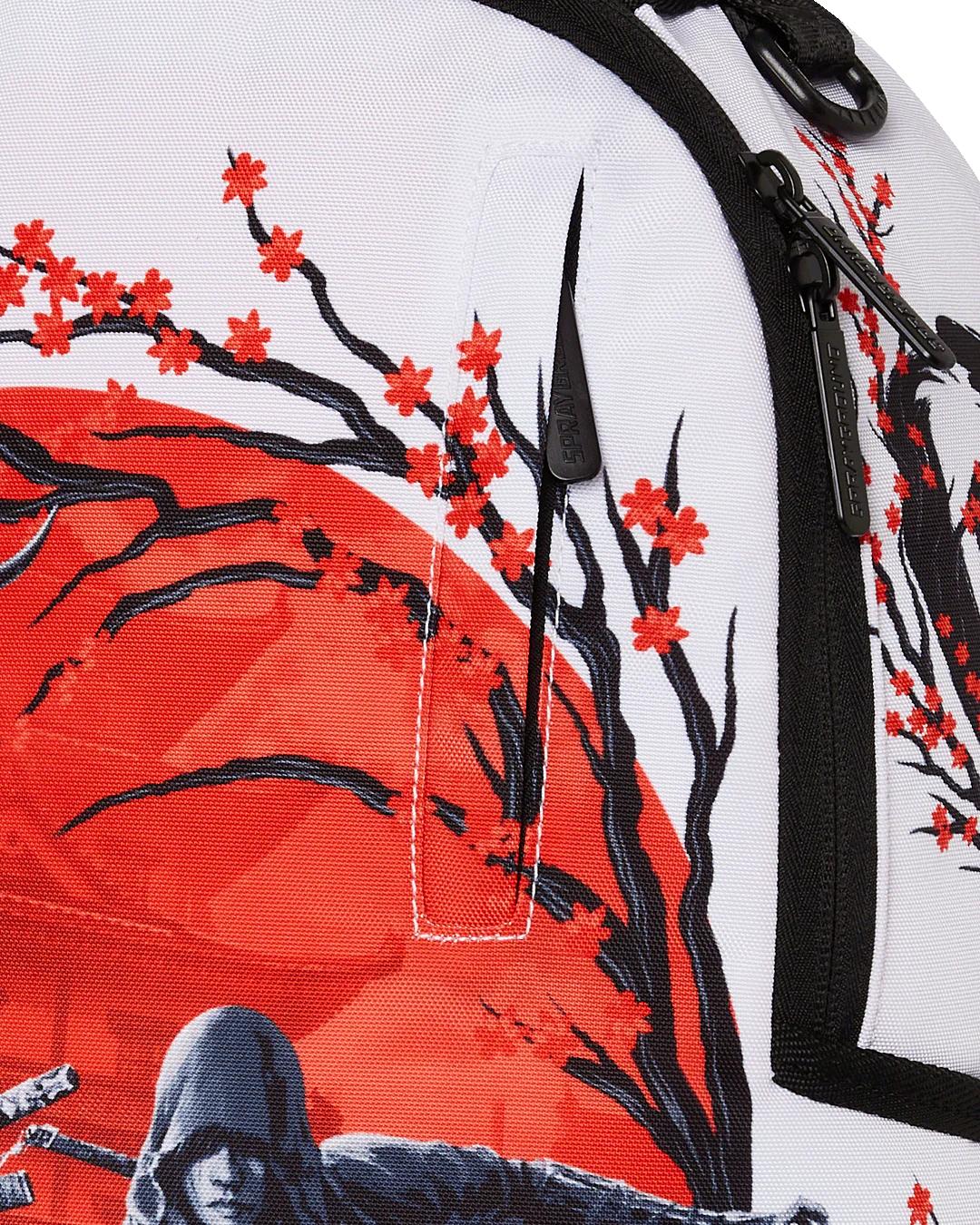 ASSASSIN'S CREED SHADOWS RISING SUN BACKPACK | Sprayground Essential