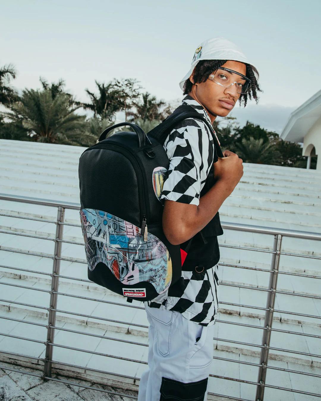 OFFICIAL BASQUIAT UNTITLED 1982 BACKPACK (DLXV) | Sprayground Featured