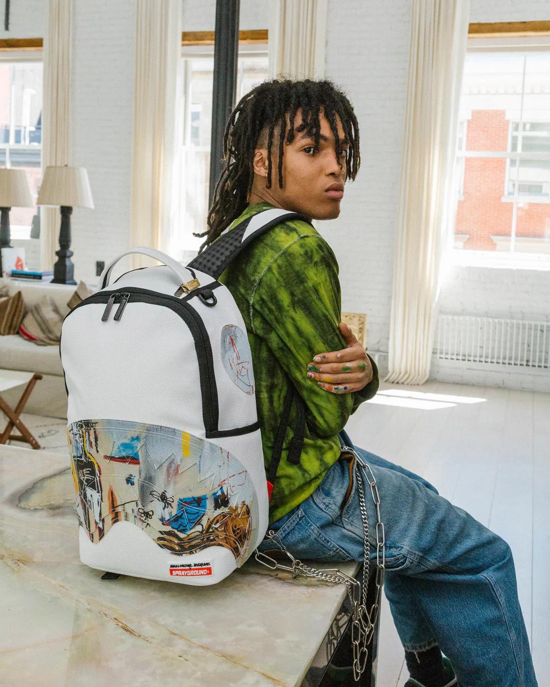 OFFICIAL BASQUIAT ACQUE PERICOLOSE 1981 BACKPACK (DLXV) | Sprayground Popular