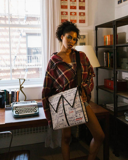 OFFICIAL BASQUIAT UNTITLED (CHEESE POPCORN) 1983 SLING MESSENGER | Sprayground Exclusive