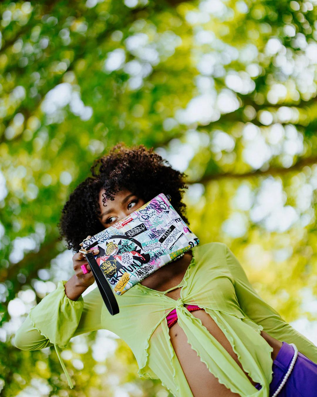 CREATE ANOTHER DAY CROSSOVER CLUTCH W/ SHOULDER STRAP | Sprayground Featured