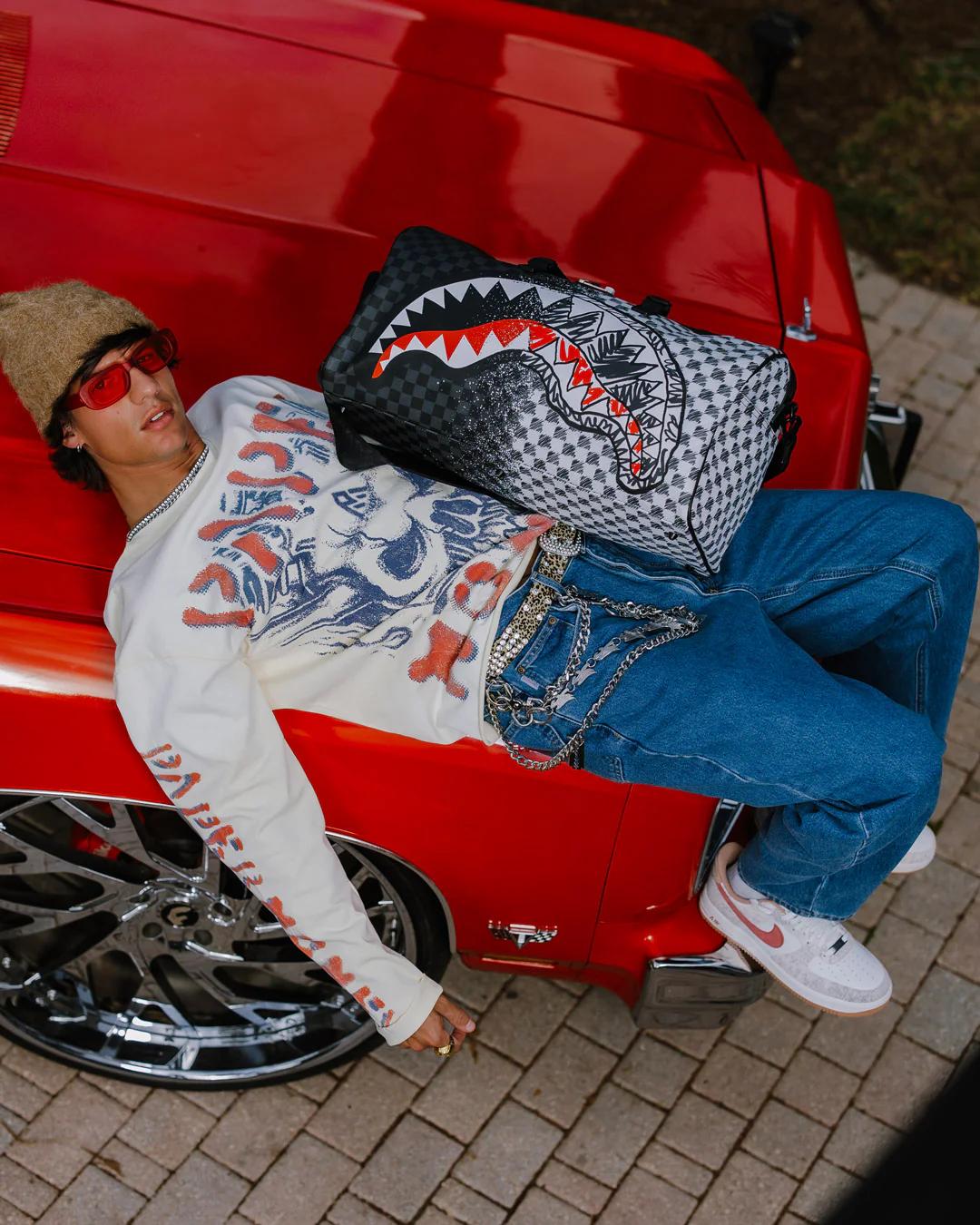 SCRIBBLE DRIBBLE CHECK DUFFLE | Sprayground Trending