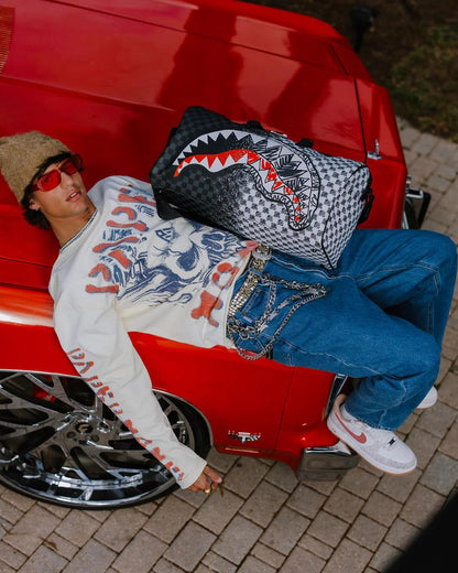 SCRIBBLE DRIBBLE CHECK DUFFLE | Sprayground Trending