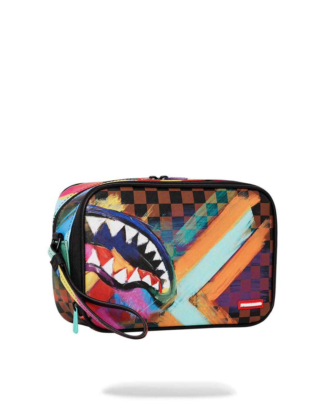 SHARKS IN PARIS CITY STREAKS TOILETRY BAG | Sprayground Signature