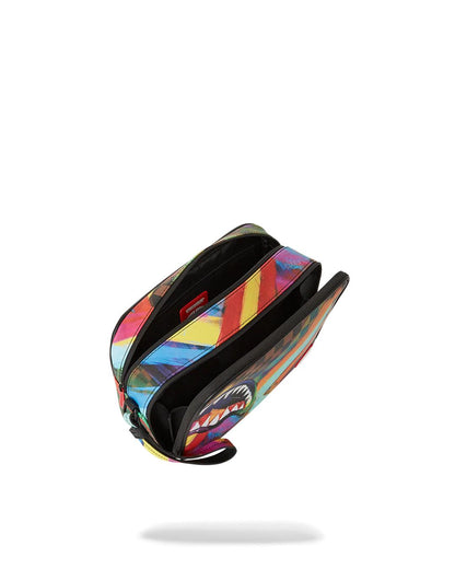 SHARKS IN PARIS CITY STREAKS TOILETRY BAG | Sprayground Signature