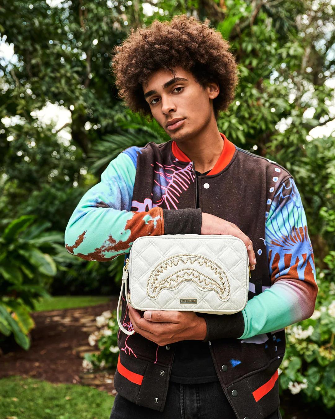 RIVIERA LE BLANC GOLD CHAIN SHARK TOILETRY BAG | Sprayground Signature