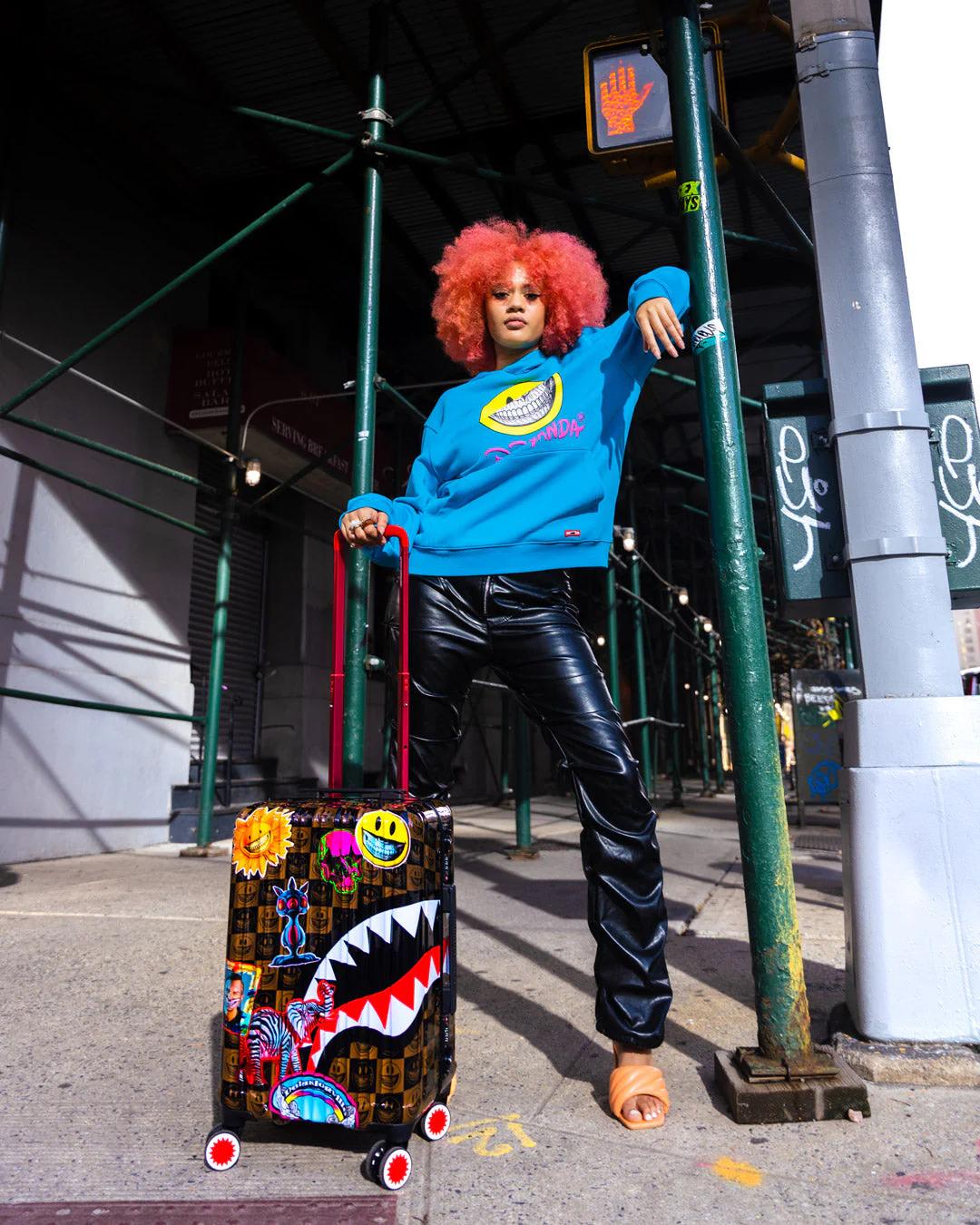 GLOBAL MOGUL POPAGANDA RON ENGLISH EDITION HARDSHELL CARRY-ON LUGGAGE | Sprayground Latest