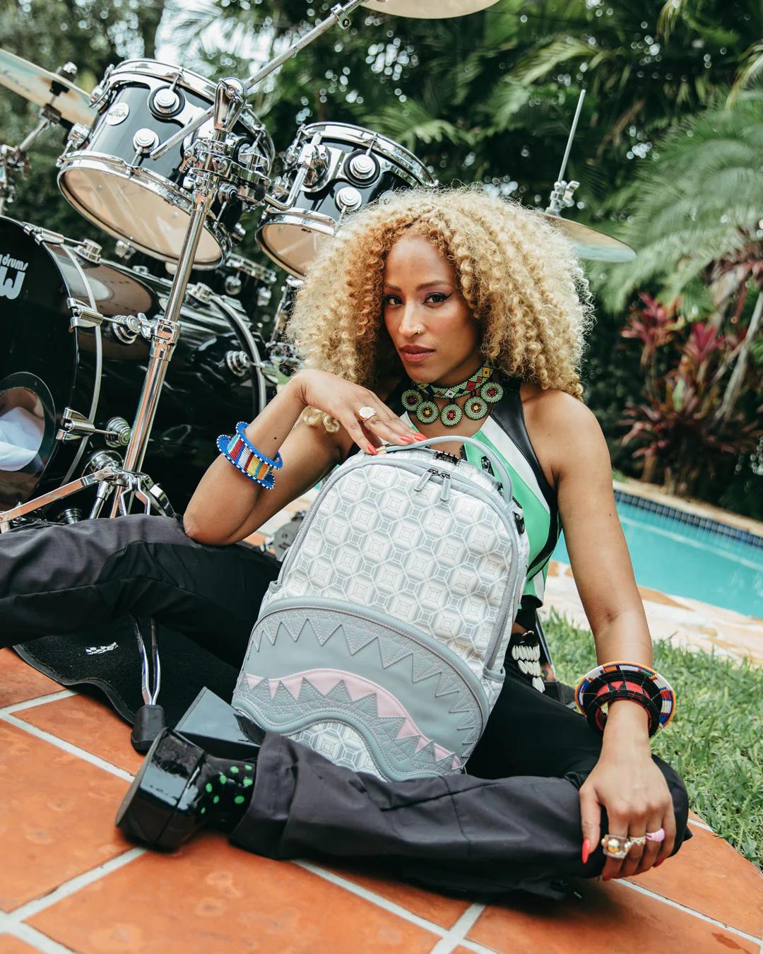 A.I.8 AFRICAN INTELLIGENCE BOOKED & BUSY BACKPACK | Sprayground Value