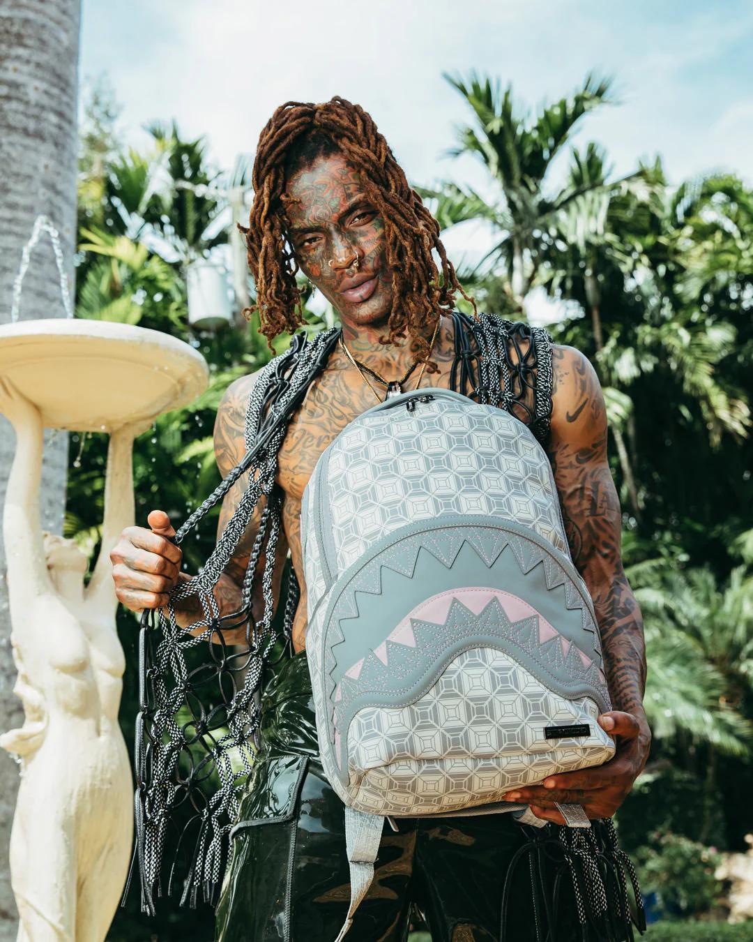 A.I.8 AFRICAN INTELLIGENCE BOOKED & BUSY BACKPACK | Sprayground Value