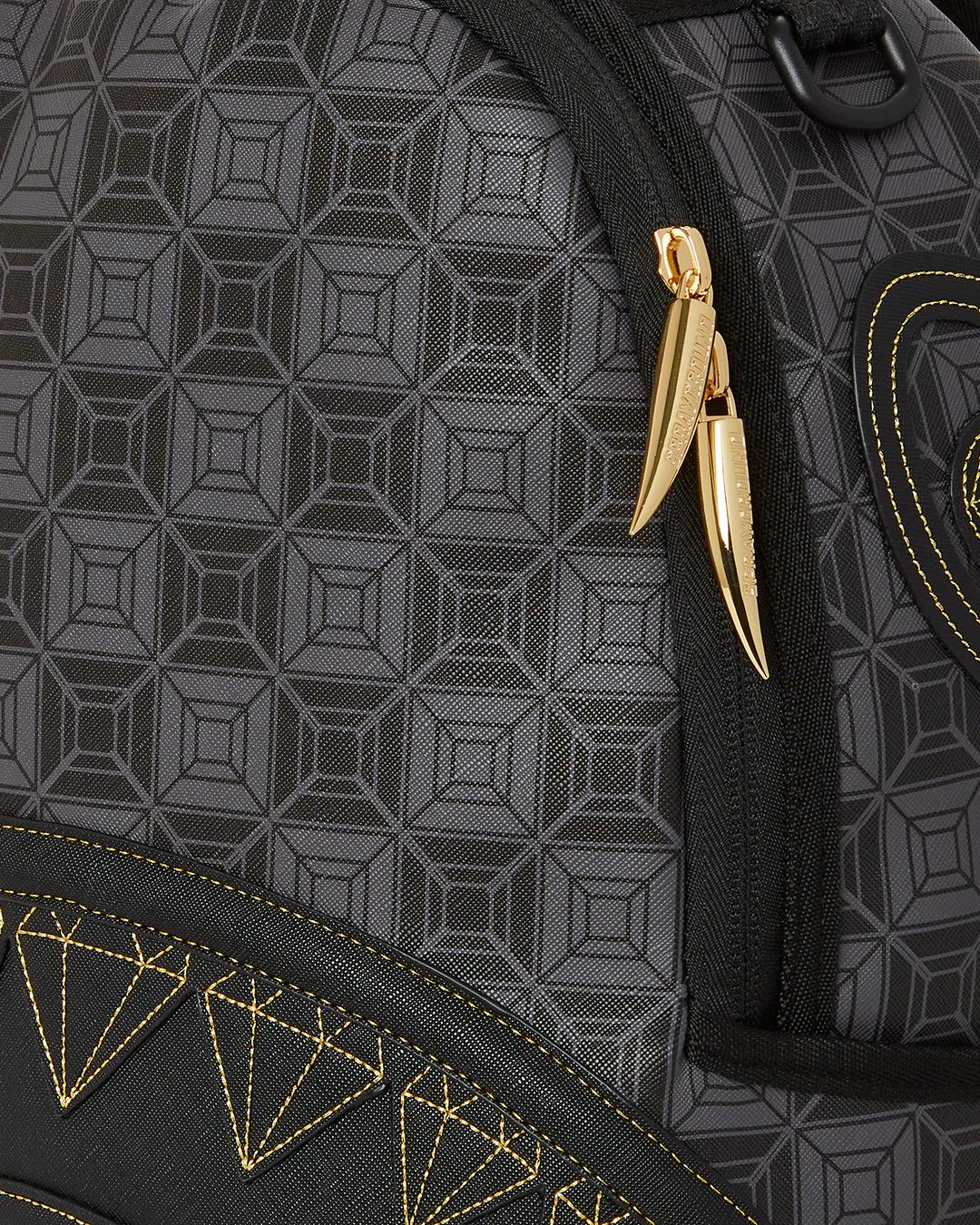 OBSIDIAN STUNNER A.i.6 SANDFLOWER COLLAB BACKPACK (DLXV) | Sprayground Best Seller