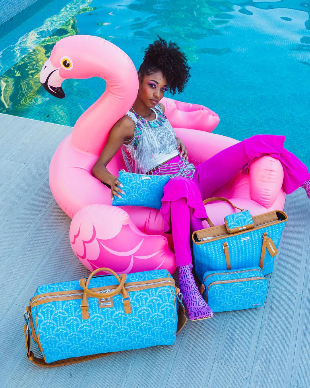 ILLUCHAINS TURQ CROSSOVER CLUTCH | Sprayground Everyday