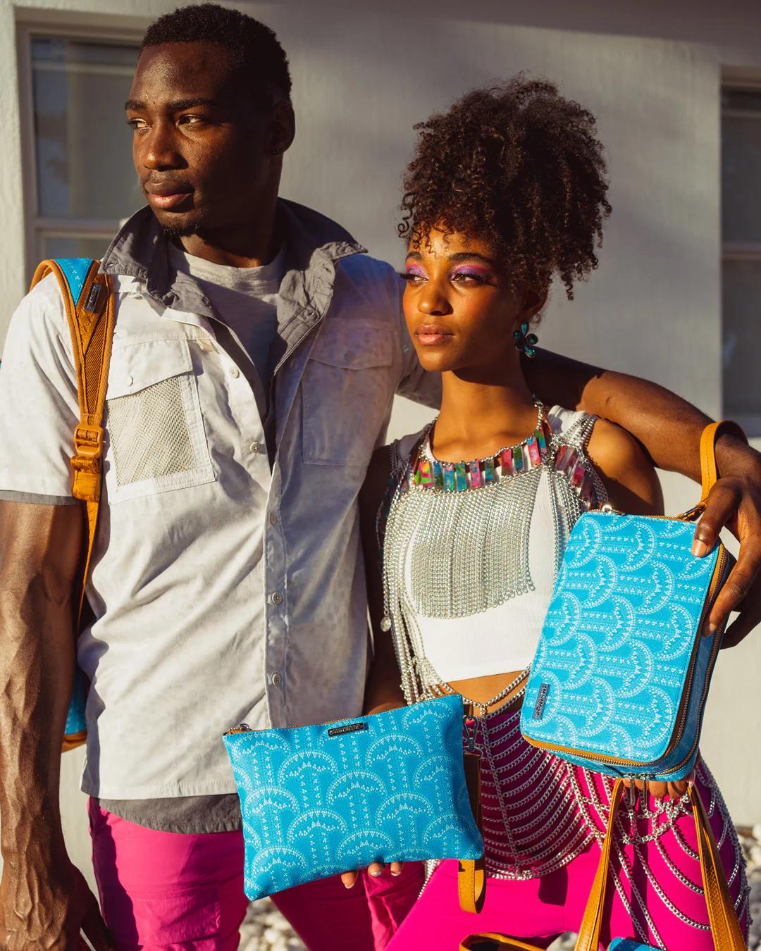 ILLUCHAINS TURQ CROSSOVER CLUTCH | Sprayground Everyday
