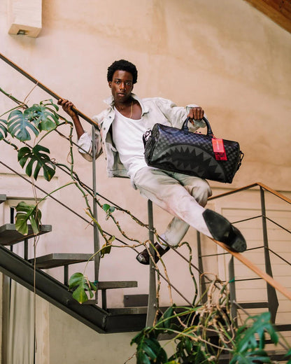 HANGOVER DRIP CHECK DUFFLE | Sprayground Classic