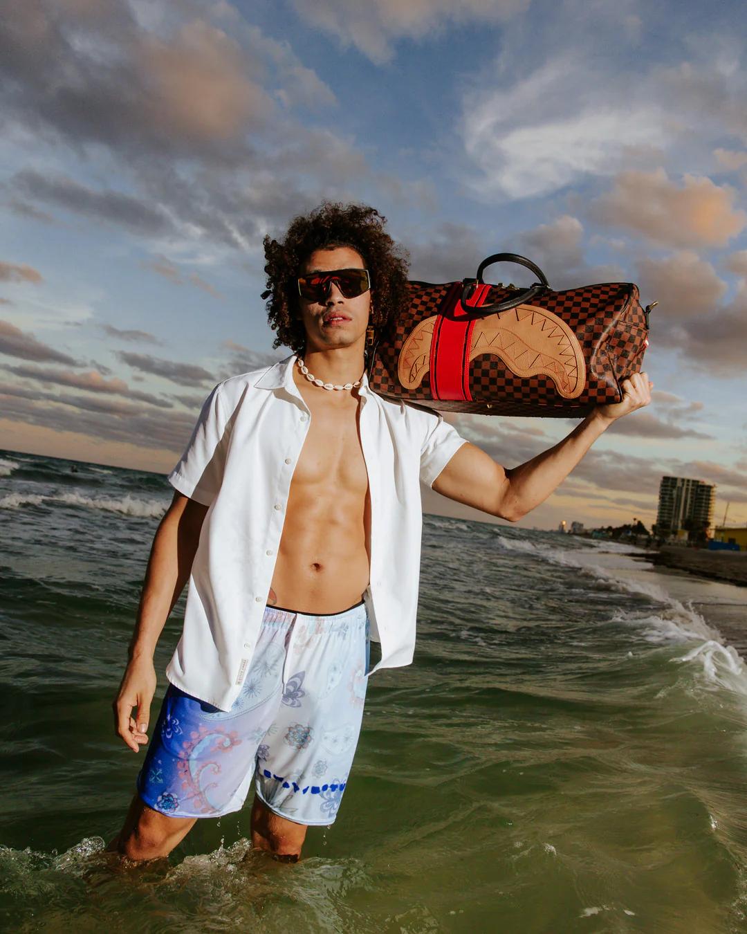 HENNY VICTORY LAP LARGE DUFFLE | Sprayground Recommended