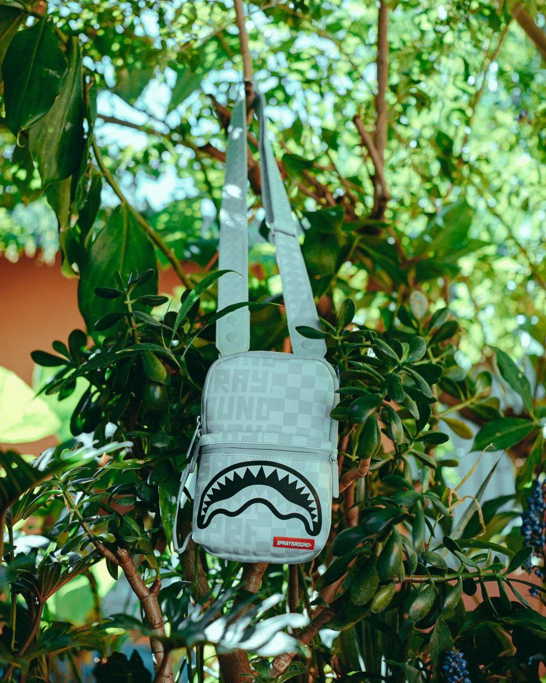 SPLIT THE CHECK (PEARL) SLING | Sprayground Essential