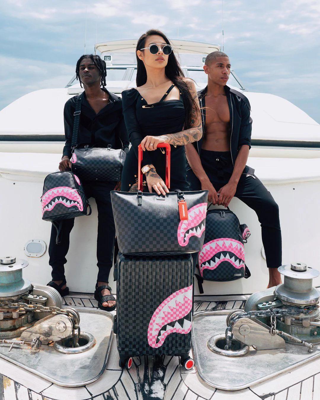 SHARKS IN CANDY CARRY-ON LUGGAGE | Sprayground Best Seller