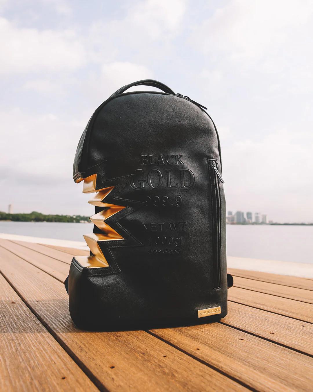 A.i.3 SHARK BITE BLACK GOLD BACKPACK (DLXV) | Sprayground Quality