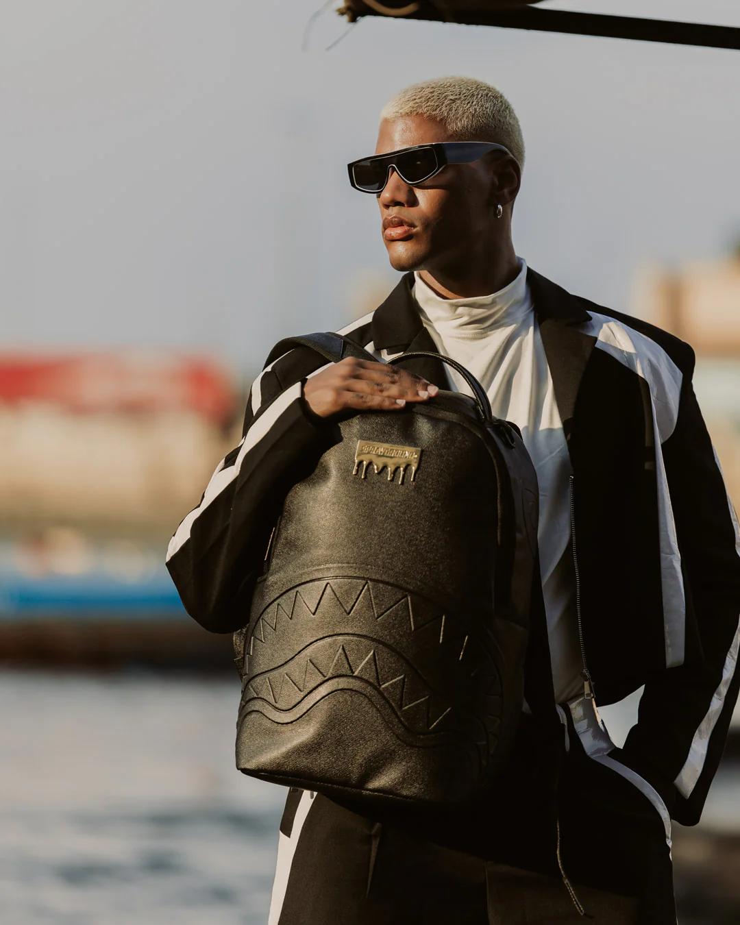 GOLD BRICK DRIP BLACK BACKPACK | Sprayground Trending