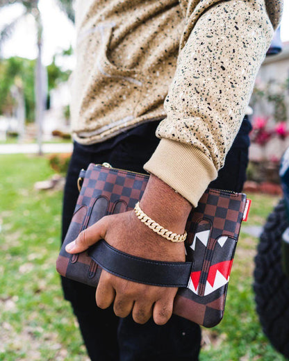 XTC SHARKS IN PARIS CROSSOVER CLUTCH | Sprayground Essential