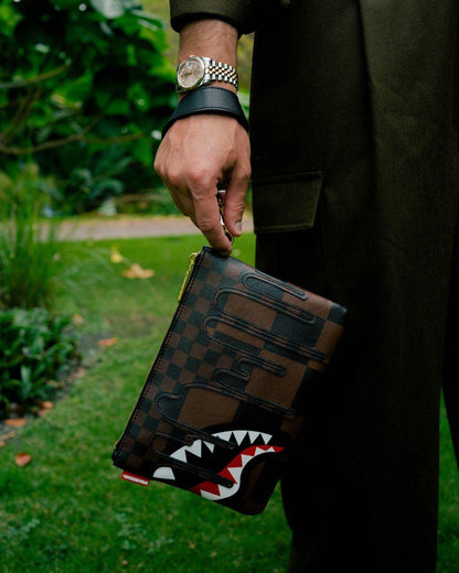 XTC SHARKS IN PARIS CROSSOVER CLUTCH | Sprayground Essential