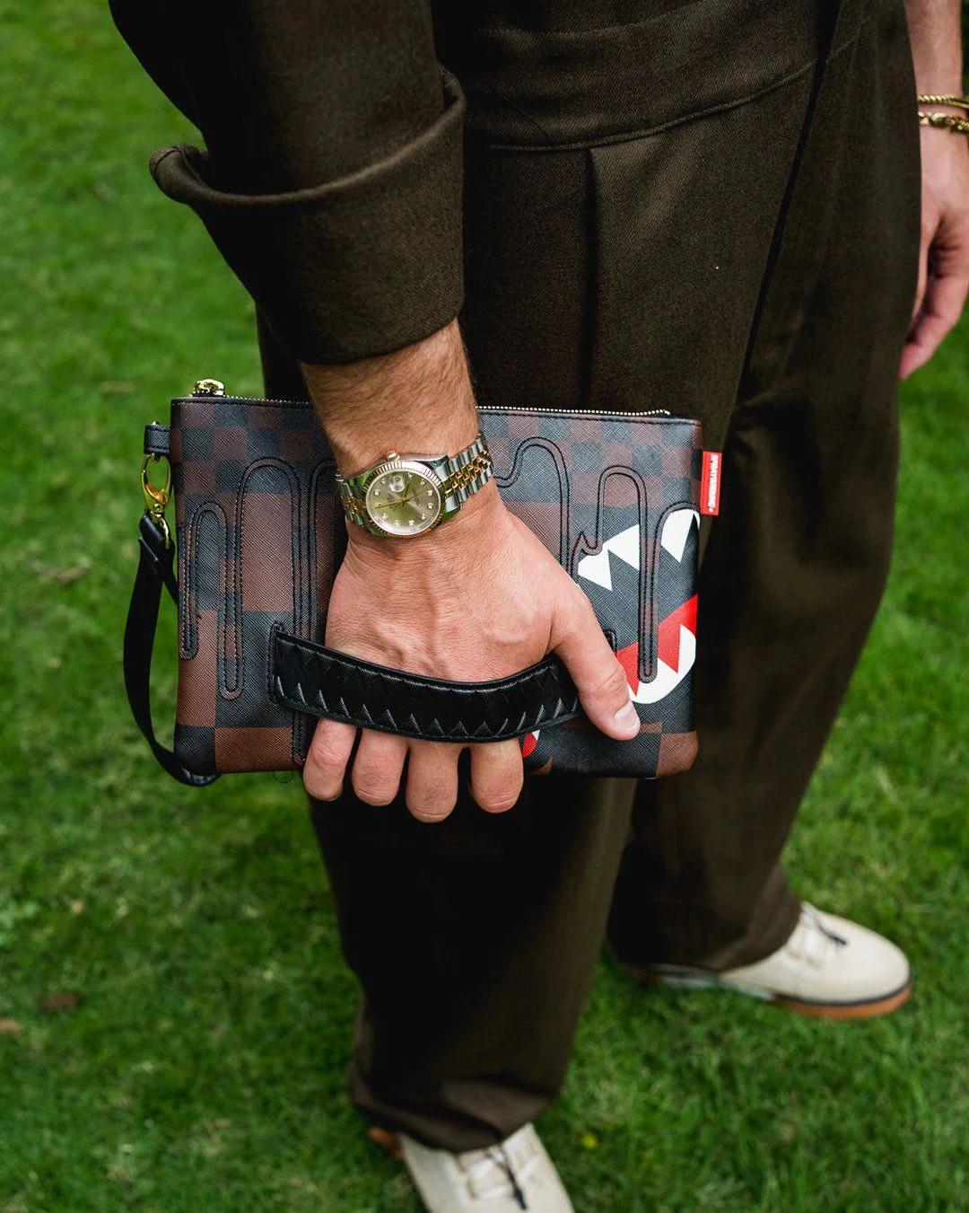 XTC SHARKS IN PARIS CROSSOVER CLUTCH | Sprayground Essential