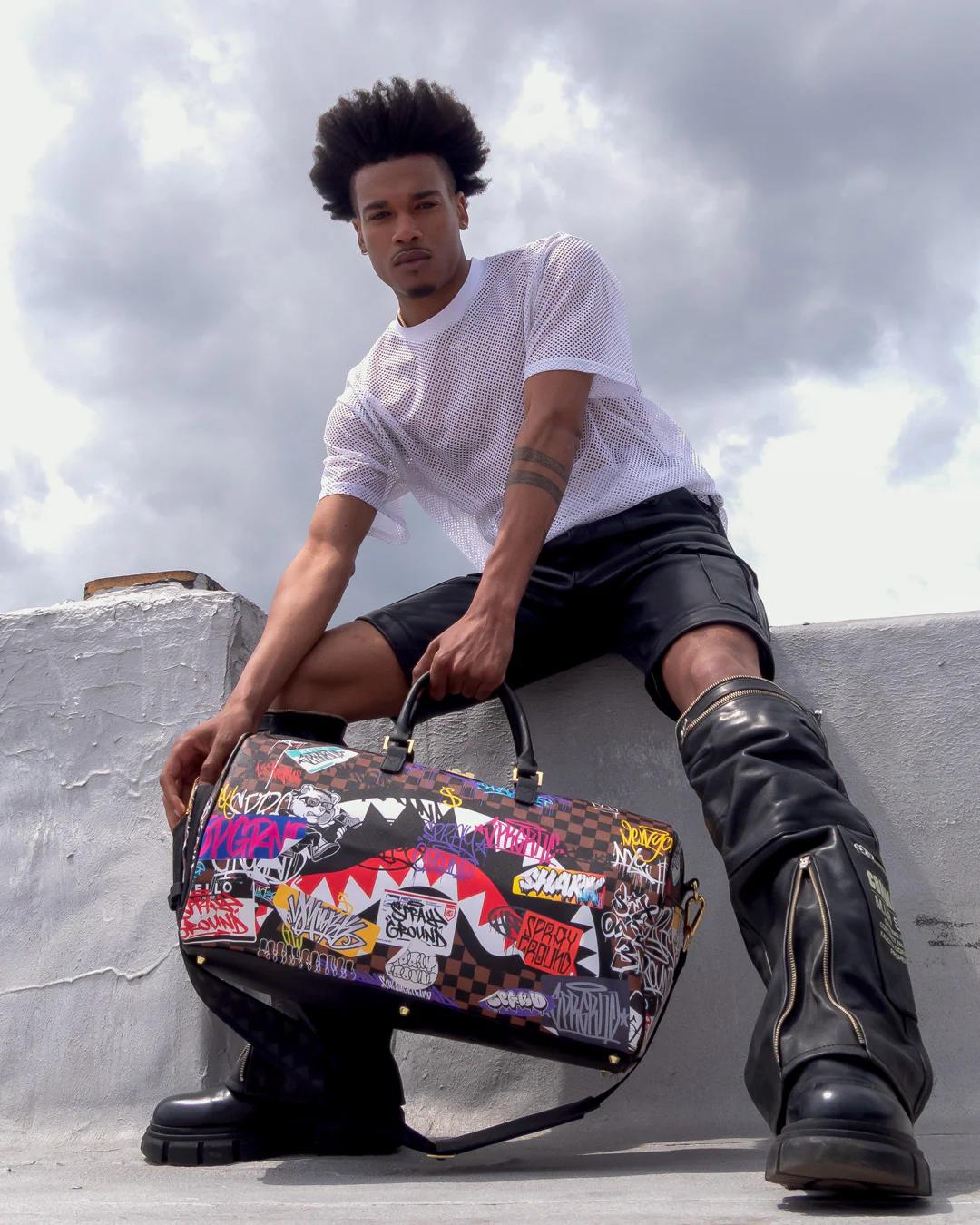 SHARKS IN PARIS THE RIZZ DUFFLE | Sprayground Classic
