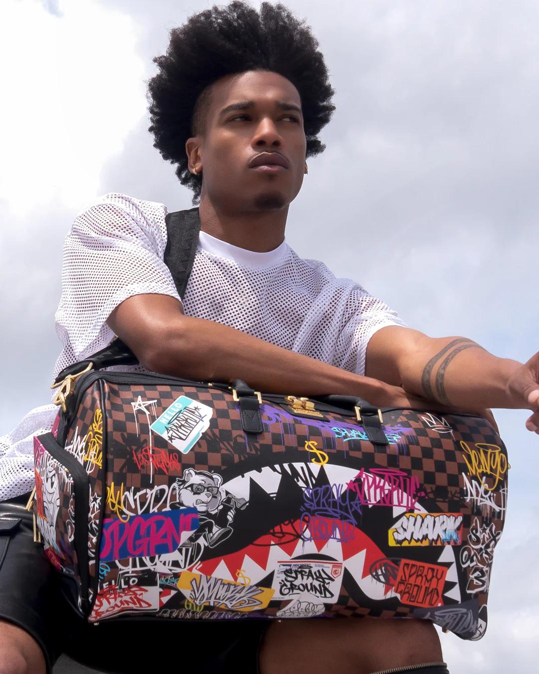 SHARKS IN PARIS THE RIZZ DUFFLE | Sprayground Classic