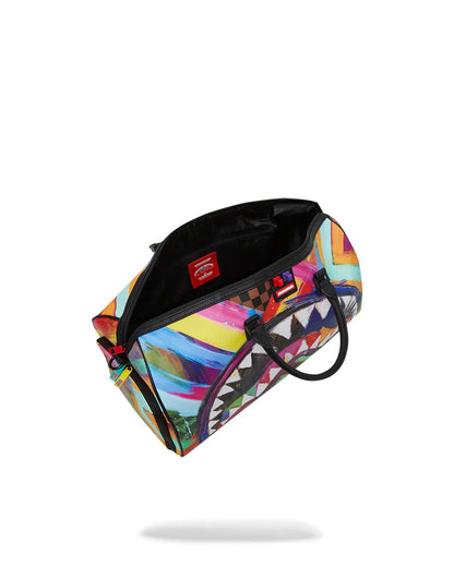 SHARKS IN PARIS CITY STREAKS DUFFLE | Sprayground Signature