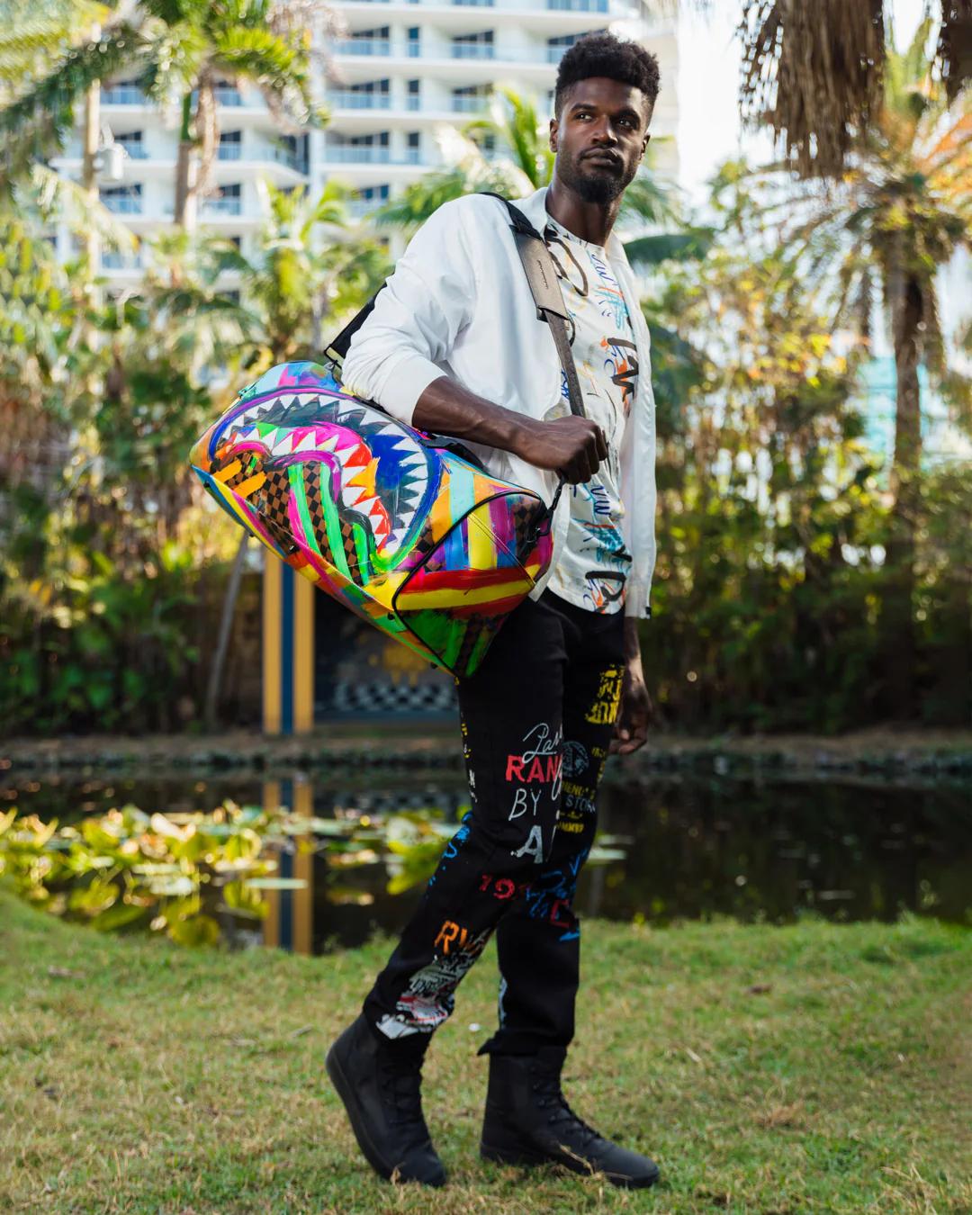 SHARKS IN PARIS CITY STREAKS DUFFLE | Sprayground Signature