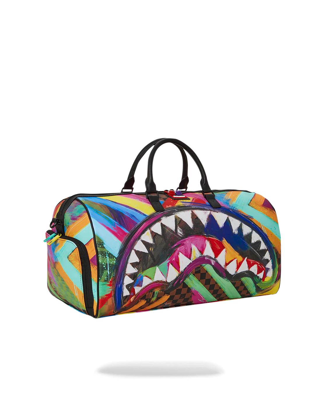 SHARKS IN PARIS CITY STREAKS DUFFLE | Sprayground Signature
