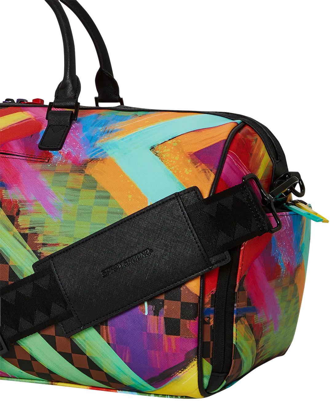 SHARKS IN PARIS CITY STREAKS DUFFLE | Sprayground Signature
