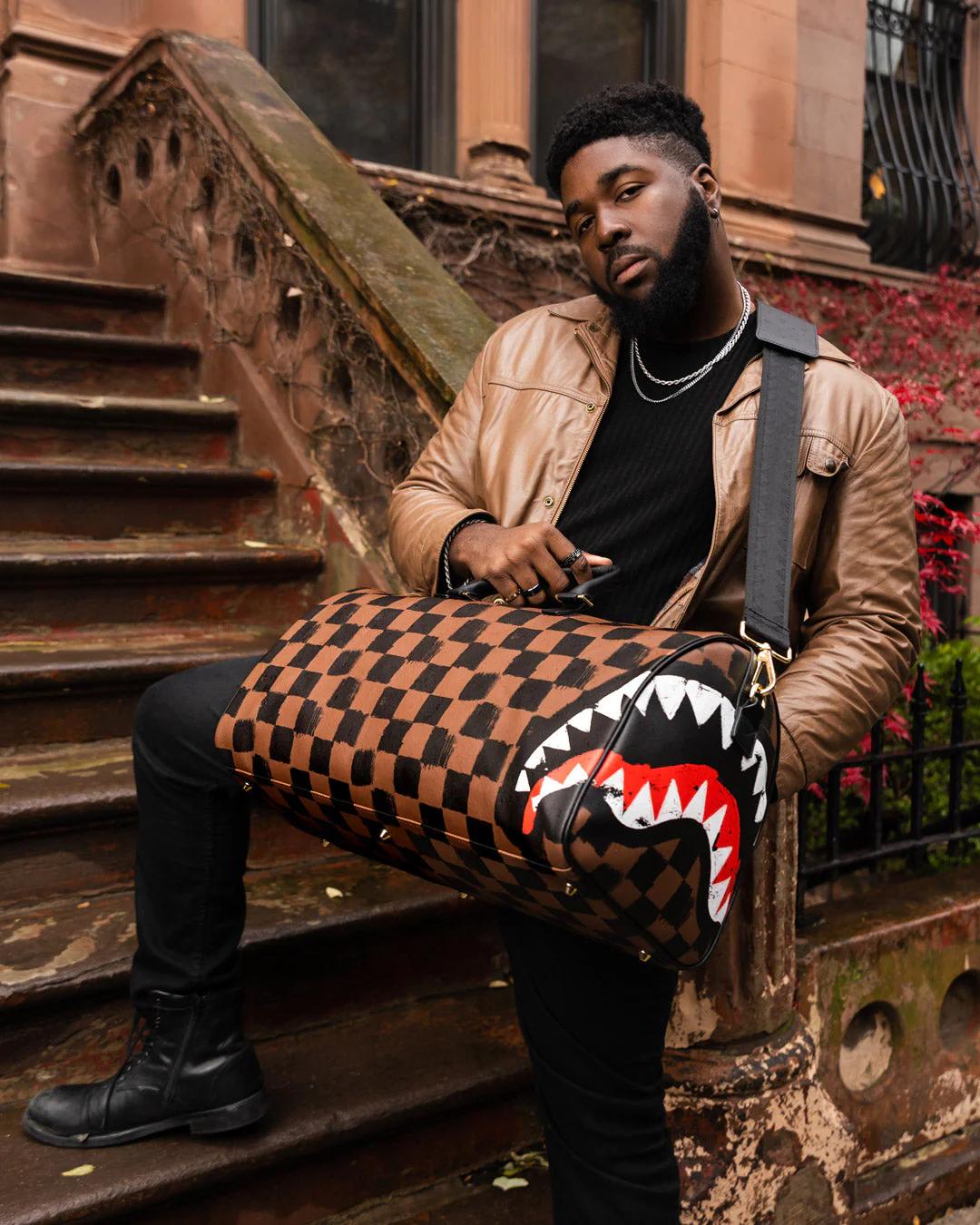 SHARKS IN PARIS VANQUISH DUFFLE | Sprayground Exclusive