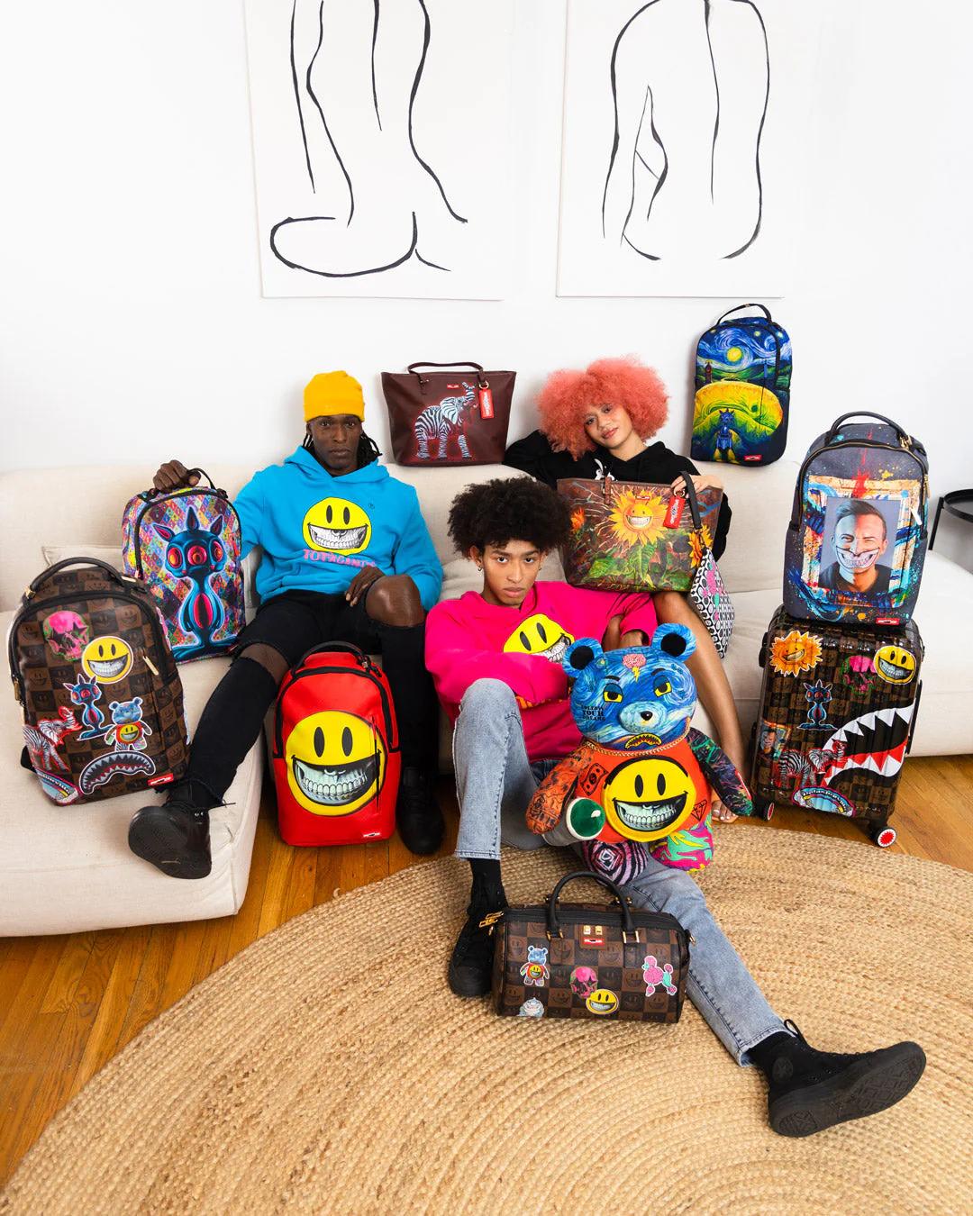 GLOBAL MOGUL POPAGANDA RON ENGLISH EDITION MINI DUFFLE | Sprayground Great Value