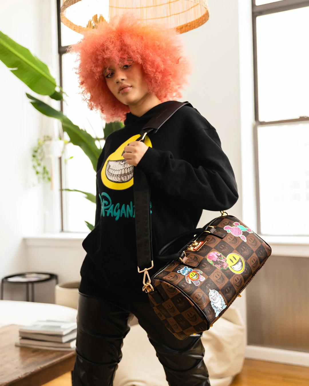 GLOBAL MOGUL POPAGANDA RON ENGLISH EDITION MINI DUFFLE | Sprayground Great Value