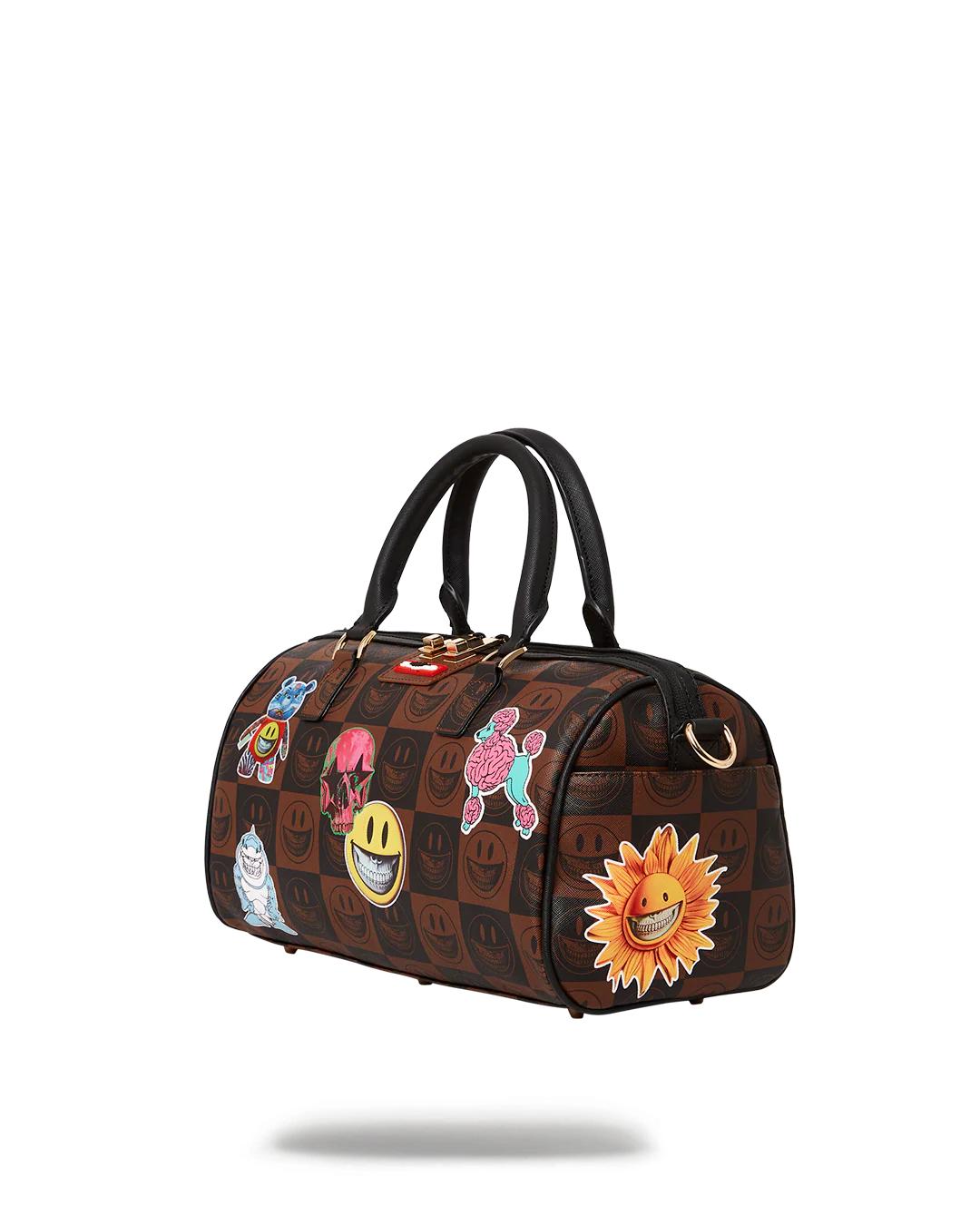 GLOBAL MOGUL POPAGANDA RON ENGLISH EDITION MINI DUFFLE | Sprayground Great Value