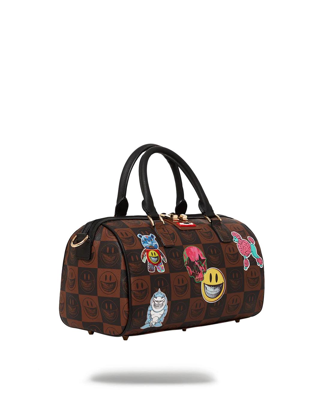 GLOBAL MOGUL POPAGANDA RON ENGLISH EDITION MINI DUFFLE | Sprayground Great Value