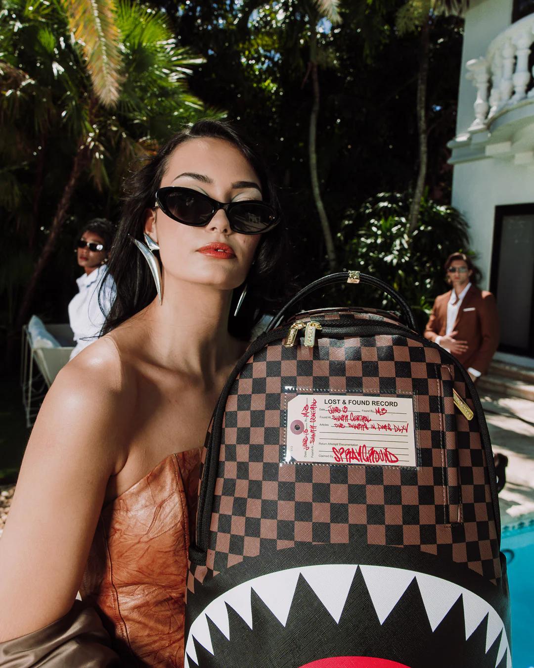 SHARKS IN PARIS LOST & FOUND BACKPACK | Sprayground Exclusive