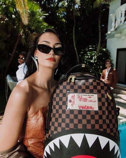 SHARKS IN PARIS LOST & FOUND BACKPACK | Sprayground Exclusive