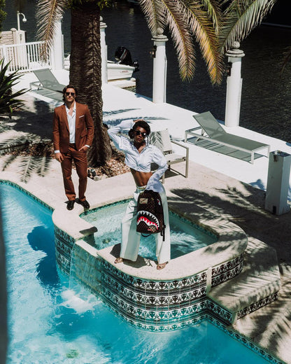 SHARKS IN PARIS LOST & FOUND BACKPACK | Sprayground Exclusive